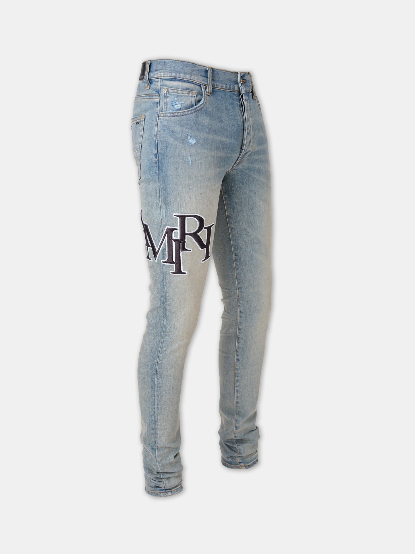 Staggered Embroidered Logo Jean - Antique Indigo | Amiri Best Seller